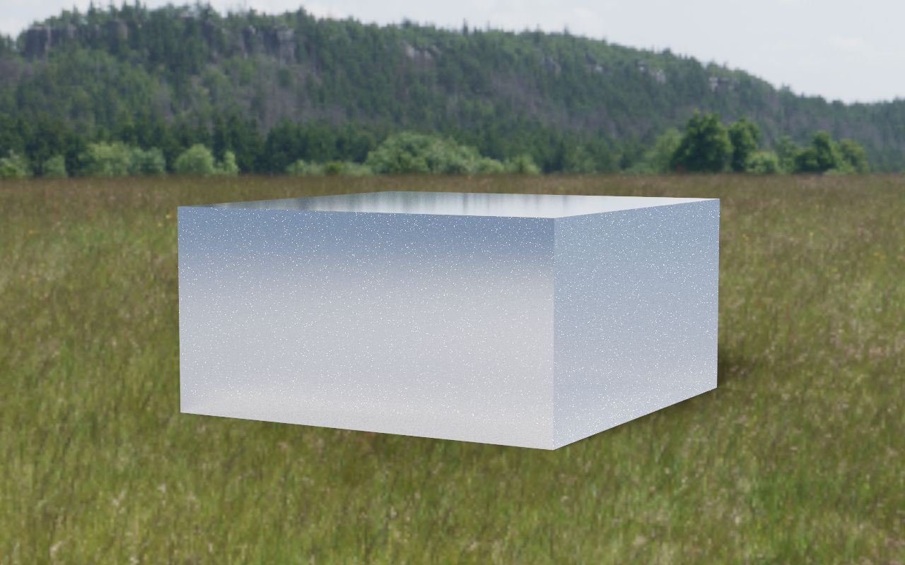 Glass block sitting in a grassy field panorama